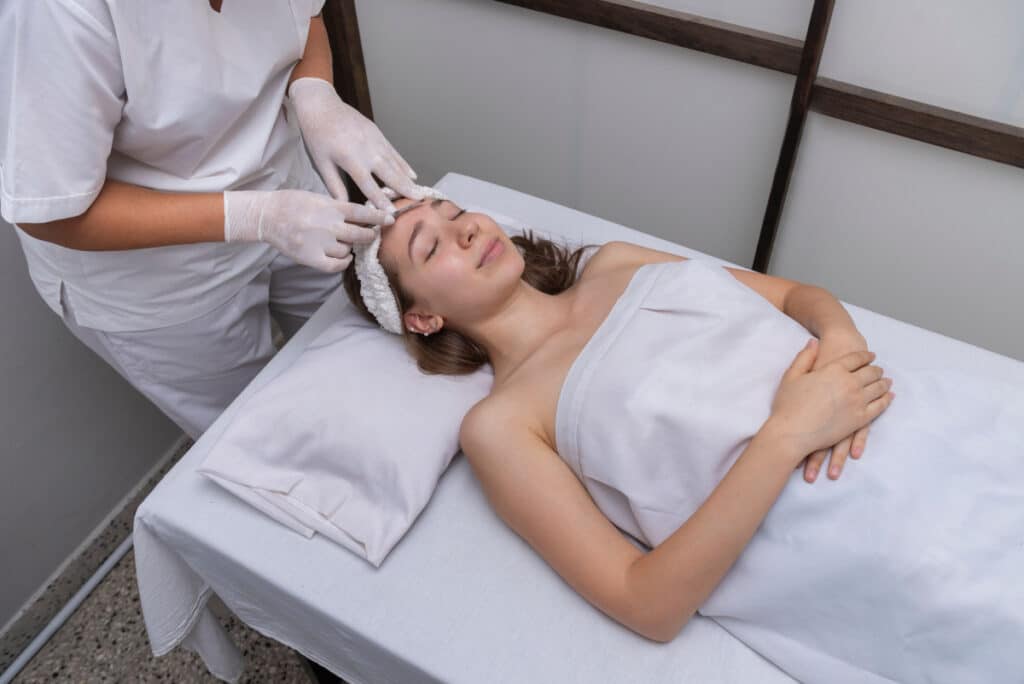 Woman getting dermaplaning in Fort Worth